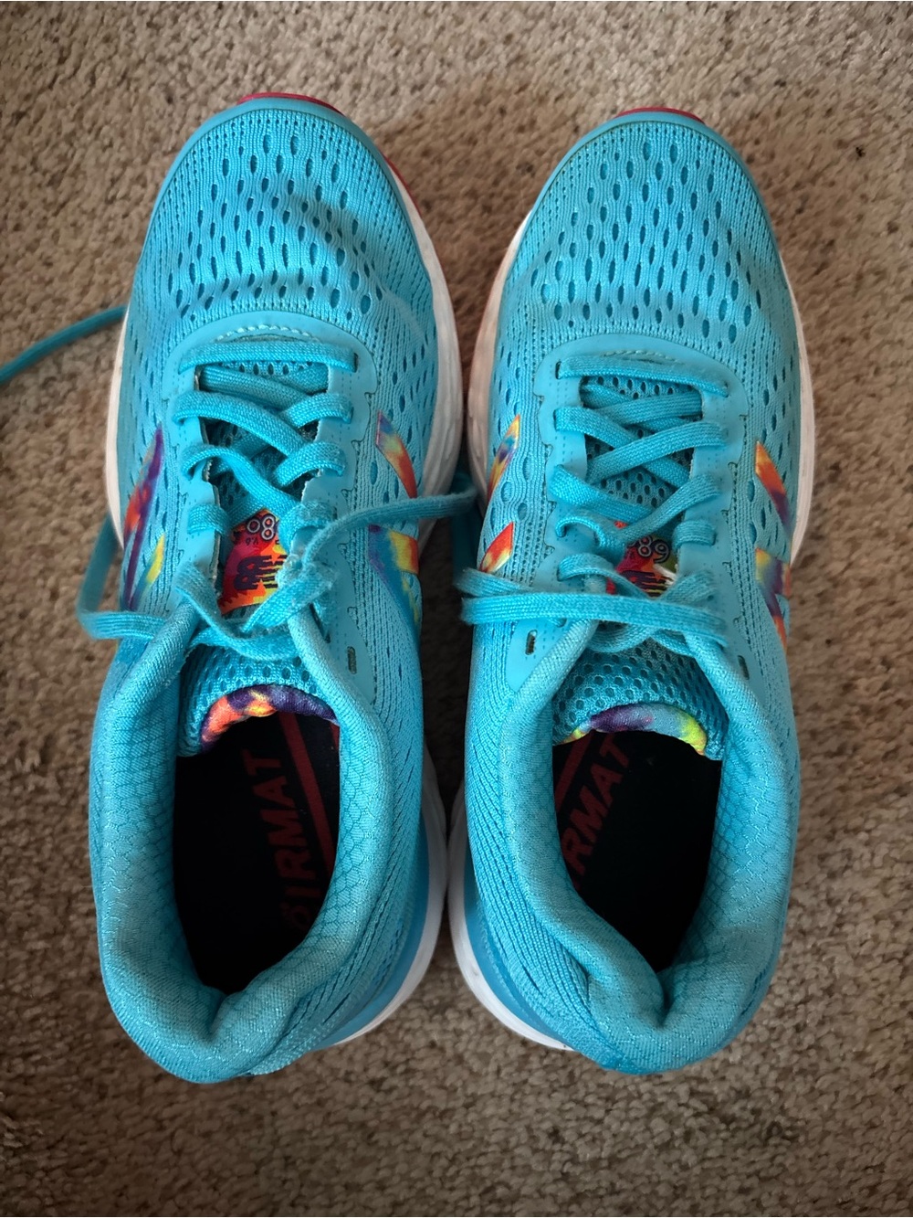 New Balance Women's Turquoise Mesh Running Sneakers with Rainbow Accents